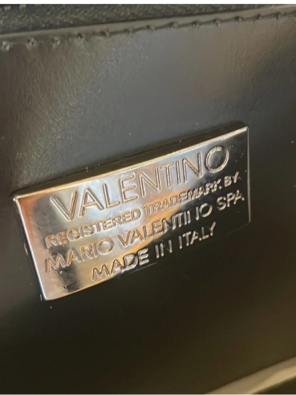 Valentino hand shoulder